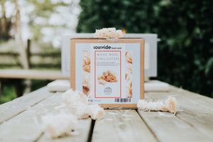 Kasai Wood Wool Firelighters - 200pcs box displayed with natural firelighters, perfect for sustainable fire lighting solutions.