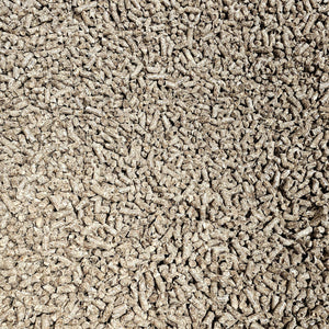 Close-up of Hickory Wood BBQ Pellets 10kg spread out, emphasizing natural wood composition ideal for outdoor smoking and grilling.