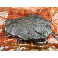 OREN Pink Butchers Paper Roll - BBQ Meat Smoking | FDA Approved unwrapped to reveal smoked brisket, highlighting moisture retention and bark preservation.