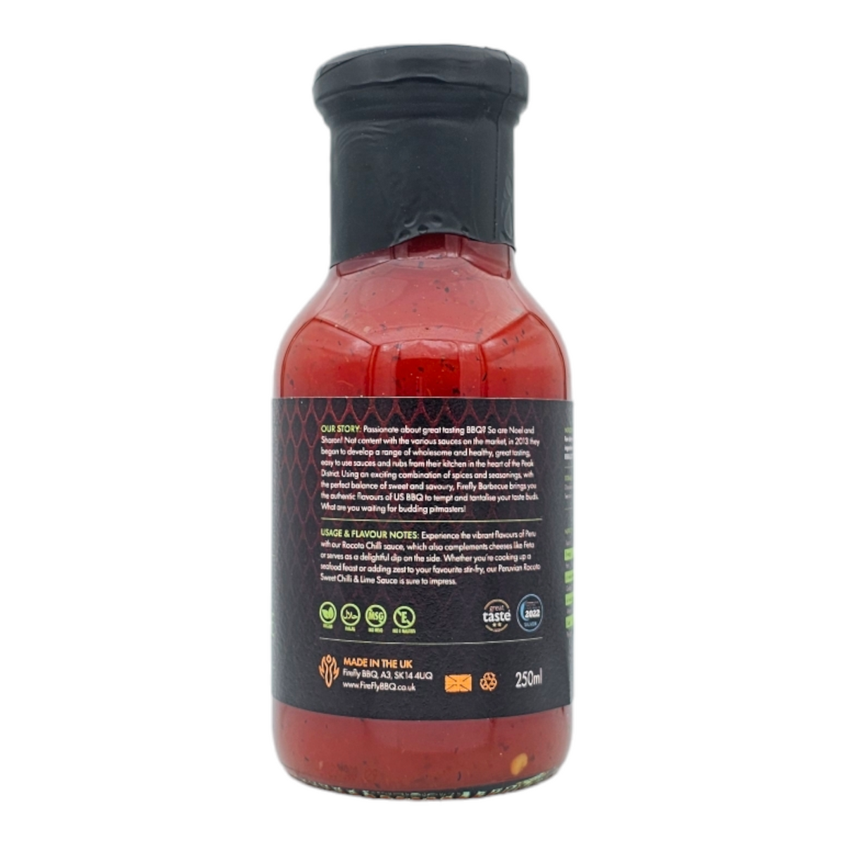 Back label of Firefly BBQ Peruvian Rocoto Chilli & Lime Sauce bottle displaying ingredients, usage tips, and certifications like vegan and gluten-free.