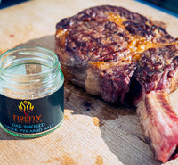 Firefly Barbecue Oak Smoked Greek Pyramid Salt on wooden surface