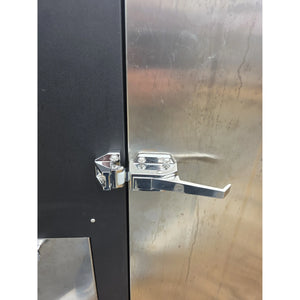 Heavy-duty latch and handle on Borniak Commercial Smoker door ensuring secure closure and heat retention during BBQ smoking.
