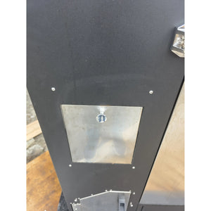 Metal access panel on Borniak Commercial Smoker for maintenance and control of internal components in commercial BBQ setups.