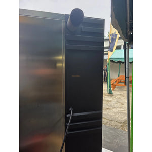 Rear exhaust pipe and power cord of Borniak Commercial Smoker for proper ventilation and electrical connection in outdoor BBQ use.