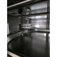 Stainless steel interior of a commercial smoker