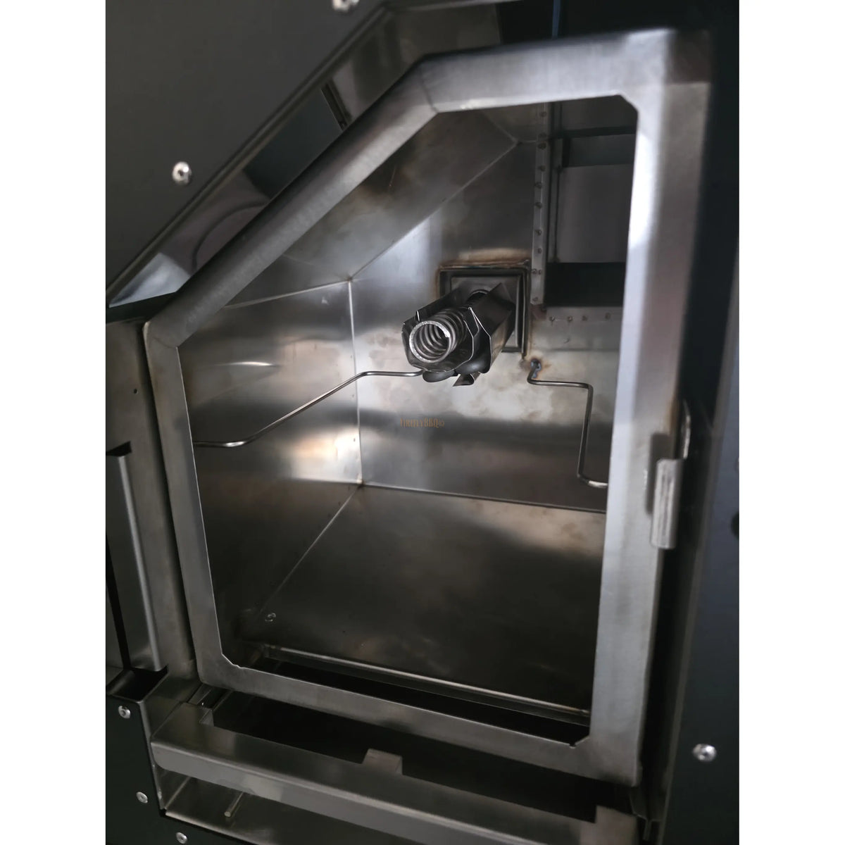 Side view of smoker's black exterior with screws