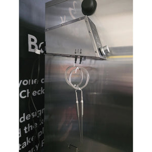 Close-up of Borniak 150L BBQ Smoker WiFi Stainless Steel temperature probes for precise digital control during outdoor smoking sessions.