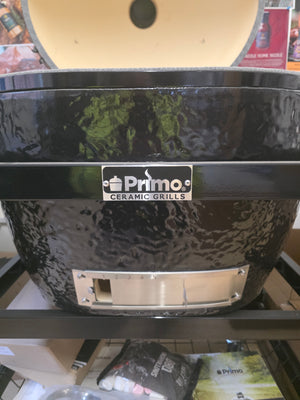 Front view of Primo Kamado Charcoal Grill with logo and vent, showcasing its durable ceramic construction for outdoor kitchens.