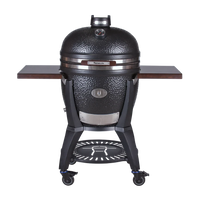 Black Monolith Kamado grill with textured surface and high-quality stainless steel fittings