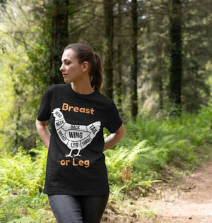 Woman wearing black Womens BBQ Chicken T-Shirt with chicken cut diagram and bold orange 'Breast or Leg' text, ideal for BBQ fans.
