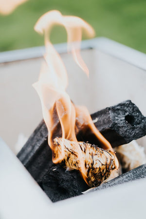 Flames rising from burning Kasai Wood Wool Firelighter and charcoal, showing effective ignition for home and garden fires.