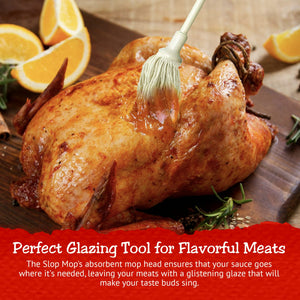 Bone Suckin' The Slop Mop BBQ Basting Tool glazing a roasted chicken with sauce, enhancing flavor and moisture for delicious home-cooked meals.