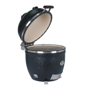 Open Monolith Kamado grill with interior grilling surface and lid