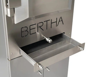 Bertha Charcoal Oven ash drawer detail, showcasing easy-clean stainless steel tray for convenient outdoor cooking maintenance.