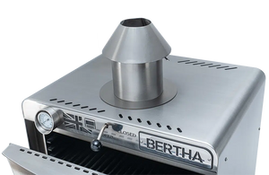 Top view of Bertha Professional X Charcoal Oven for Compact Cooking with chimney vent and precision temperature control dial.