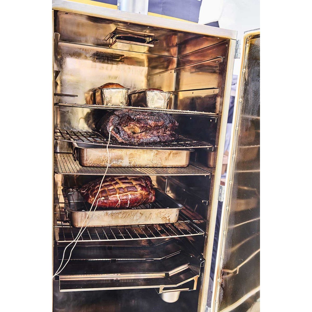 Inside view of Borniak WiFi Food Smoker with smoked meats