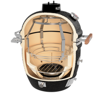 Monolith outdoor grill with internal heating chamber and metal cooking grate