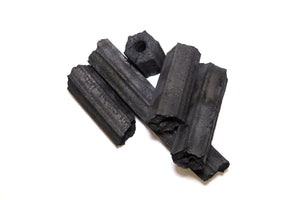 Assorted Sumi Bincho Charcoal (10kg Box) pieces with hexagonal and cylindrical shapes for optimal burning in outdoor grills.