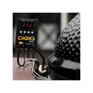 BBQ Guru DigiQ DX3 Kit connected to a ceramic grill, actively monitoring and controlling BBQ temperature with precision.
