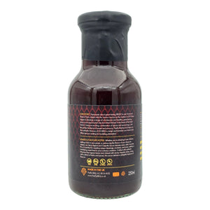 Firefly BBQ Hot Agave Nectar back label detailing brand story, vegan icons, and product origin for spicy agave & chipotle sauce.