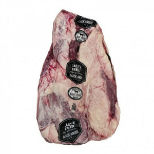 Frozen grain-fed Black Angus brisket from Jack's Creek, displaying marbled texture and sealed packaging for quality assurance.