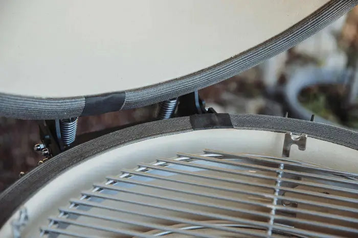 Kamado grill cooking grate with heat deflector for outdoor grilling