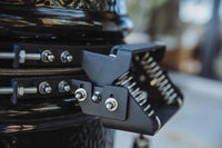 Close-up of Monolith ONE grill hinge and locking mechanism