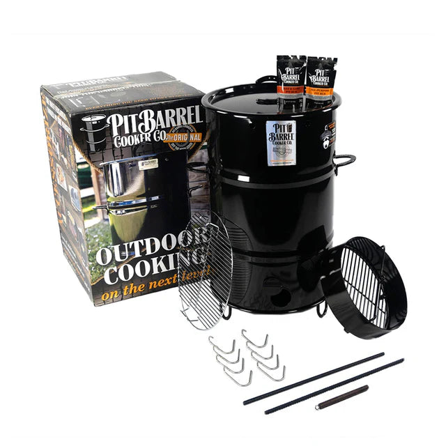 Pit Barrel Classic drum cooker with accessories for outdoor grilling and smoking
