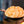 Freshly popped popcorn in a black skillet for outdoor cooking