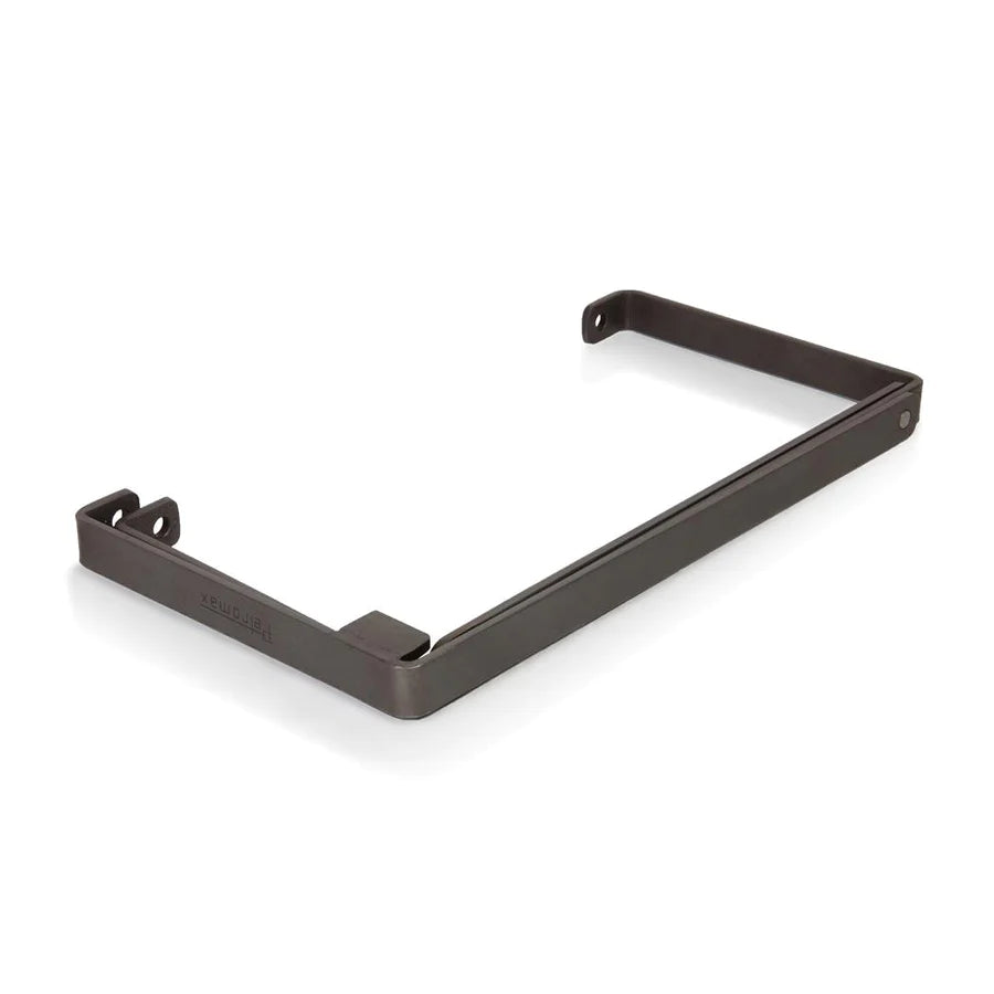 Folded Petromax Cooking Stand in compact form, designed for portability and easy storage in outdoor kitchen setups.
