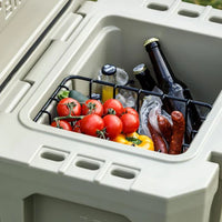 Petromax dry rack basket for cool box with tomatoes, sausages, and drinks