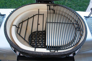 Primo grill interior with ceramic heat deflector and grill grate