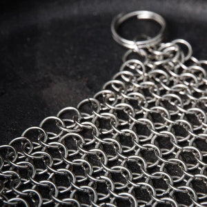 Close-up of Petromax Chain Mail Cleaner showing durable stainless steel rings, designed for effective Dutch oven cleaning.