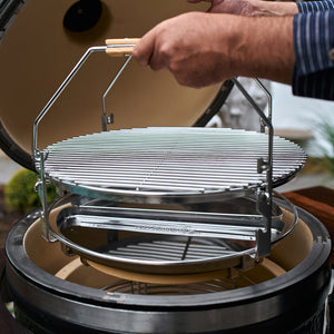 Ceramic kamado grill with metal rack and adjustable vent system