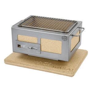 Nano Pro Kasai BBQ Stainless Steel Grill placed on a branded heat-resistant base, designed for safe tabletop grilling.