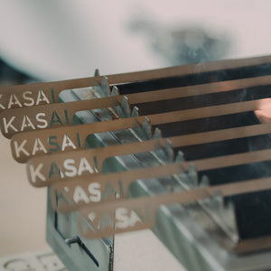 Kasai Konro Skewers aligned on a grill rack, demonstrating their compatibility with the Kasai Konro Skewer Rack for precision grilling.