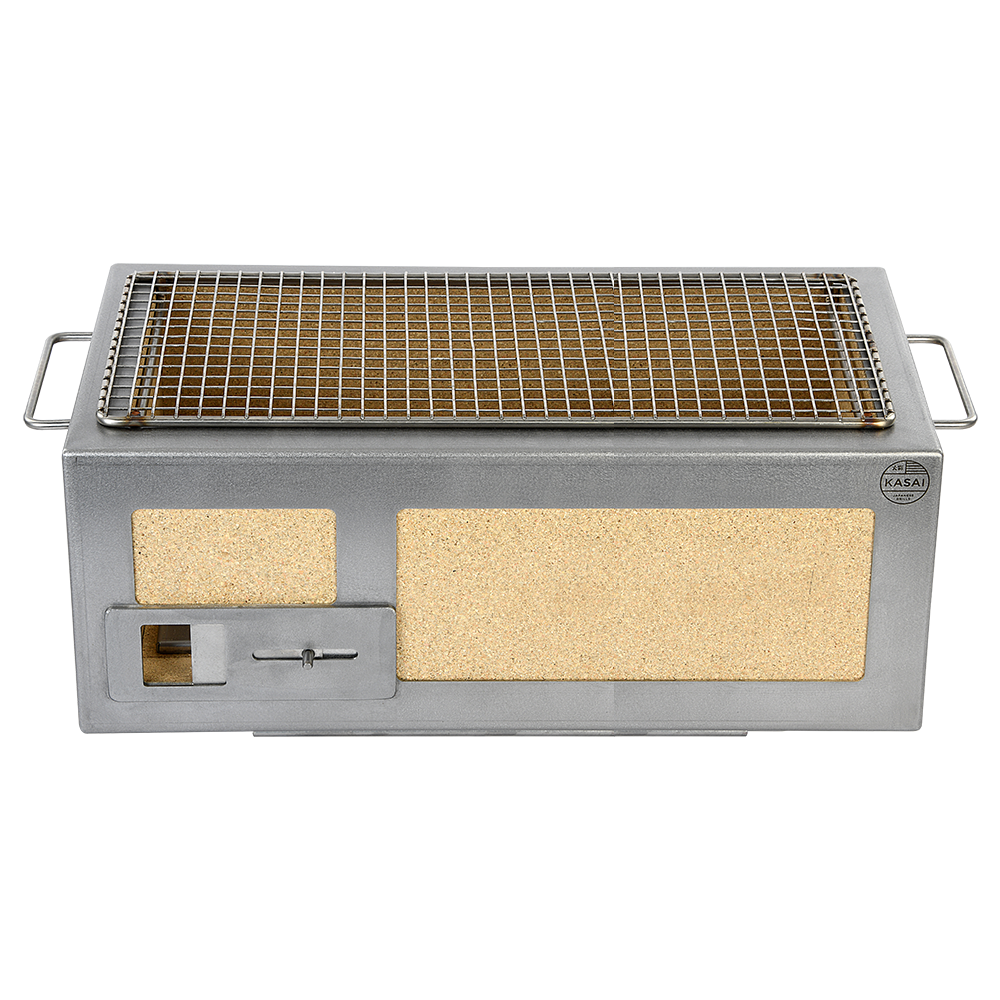 Cooking meat on a wire grill over charcoal in Kasai Konro medium BBQ grill