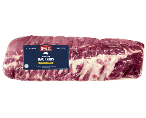 Close-up of pork back ribs with label for BBQ and smoking