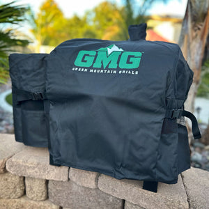 GMG Trek Prime 2.0 grill cover packaging with grill in outdoor setting