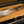 Petromax Telescopic Grill Tongs displayed on wooden countertop for grilling