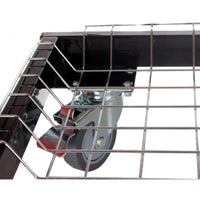 Detail of caster wheel on outdoor grill cart with wire shelf