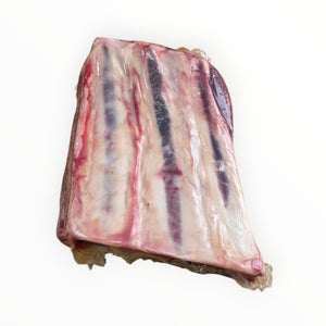 Vacuum-sealed beef short rib with label