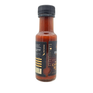 Side angle of Firefly BBQ Carolina Reaper Hot Sauce bottle showing heat rating scale. Extreme heat level for hot sauce enthusiasts.