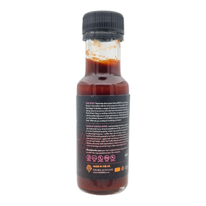 Detailed product story and usage tips on the back of 7 Deadly Wings Hot Sauce bottle, emphasizing flavor and heat intensity.