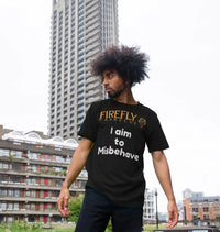 Model wearing black Firefly quote T-shirt outdoors, casual fashion