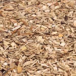 Detailed view of Borniak Hickory Smoking Chips texture, 100% natural wood chips for adding robust smoky flavour to grilled dishes.