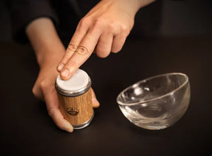 User applying water to Horl 3 Kagami – Ultra Fine Knife Sharpener, demonstrating its use for achieving ultra-precise blade edges.