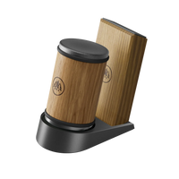 Set of Horl Dock knife sharpeners and storage containers on black background