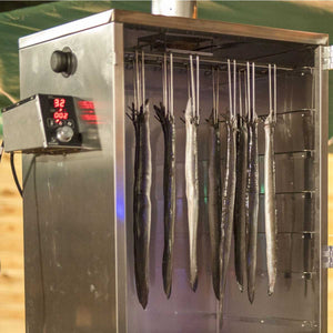 Double Smoking Hooks in use inside a Borniak smoker, securely holding fish for even smoking in an outdoor kitchen appliance.