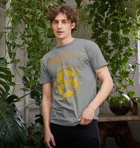 Model wearing black T-shirt with Firefly Big Damn Hero logo in cityscape